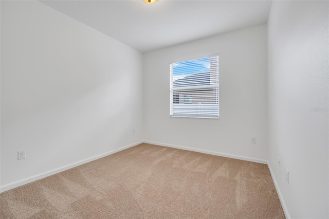 unfurnished room with carpet floors