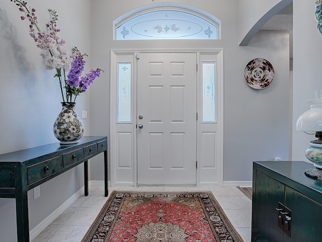 entrance foyer with light tile patterned floors