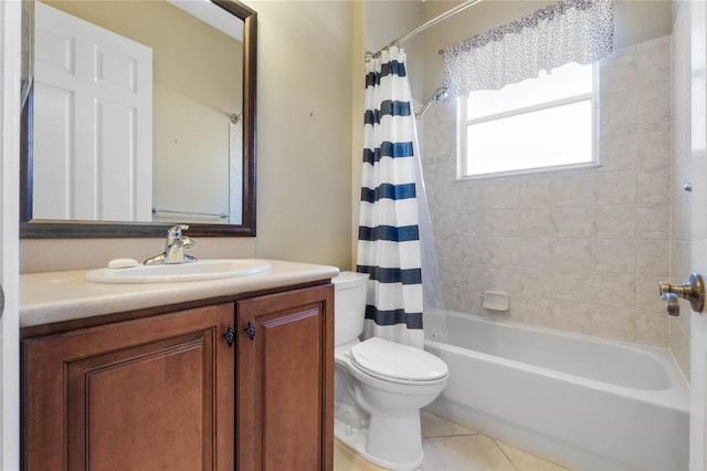 full bathroom with vanity, tile patterned floors, toilet, and shower / tub combo with curtain