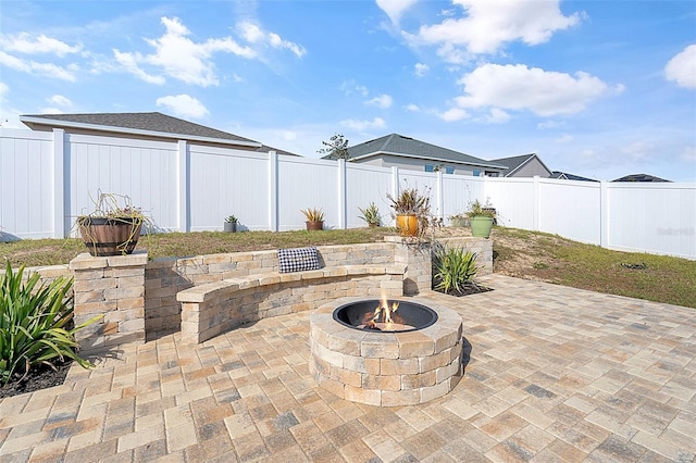 view of patio / terrace with a fire pit