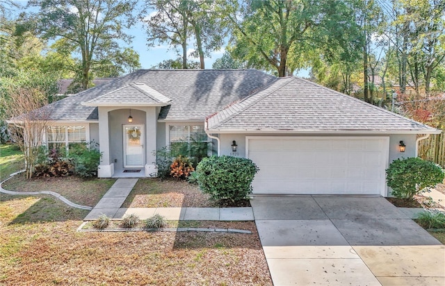 ranch-style home with a garage