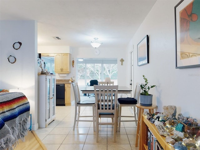 dining room with light tile patterned floors