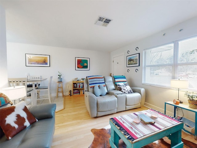 living room featuring light wood-type flooring