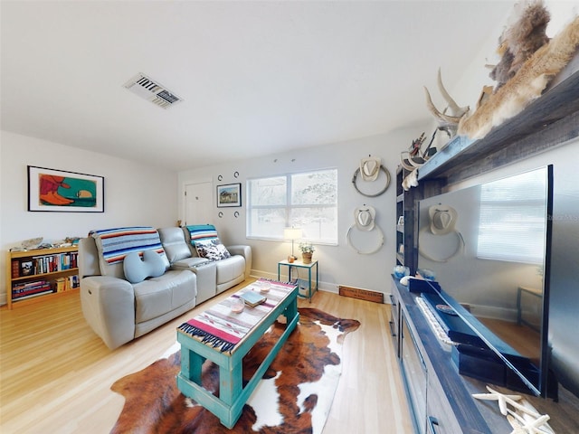 living room with hardwood / wood-style flooring