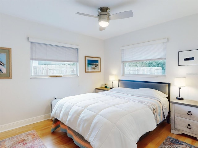 bedroom featuring ceiling fan and light wood-type flooring