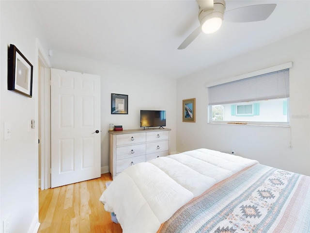 bedroom featuring ceiling fan and light wood-type flooring