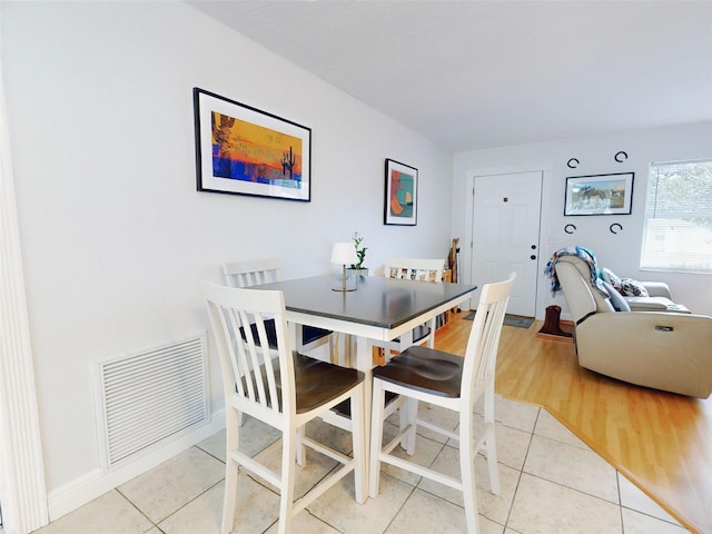 view of tiled dining space