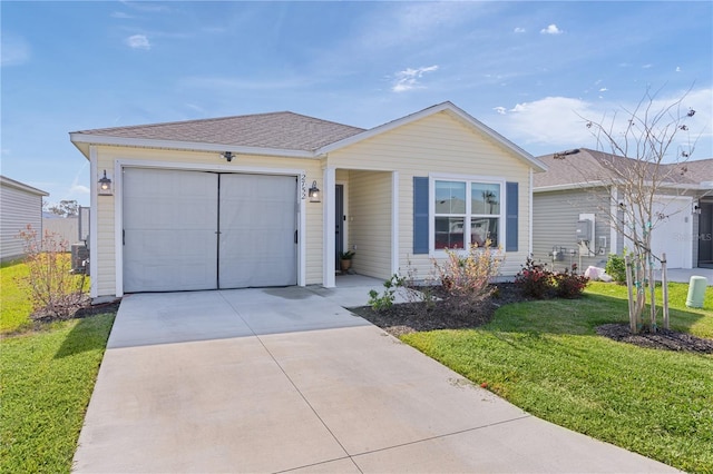 ranch-style home featuring a front lawn and a garage