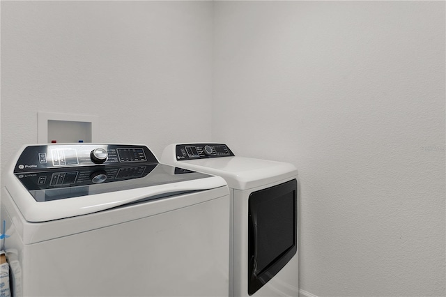 laundry area featuring independent washer and dryer