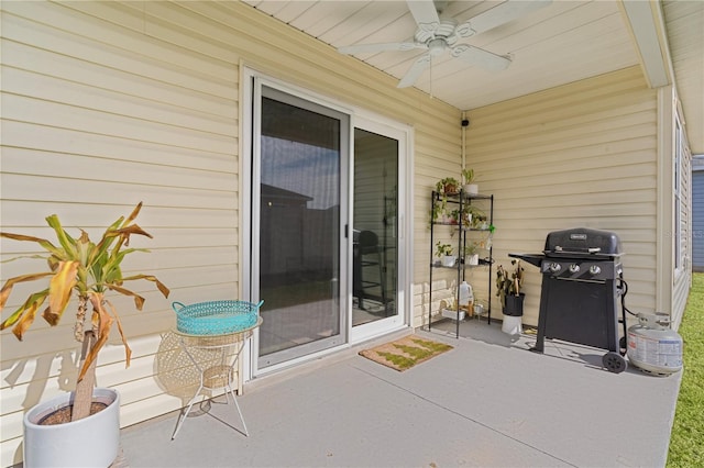 view of patio / terrace featuring ceiling fan and a grill