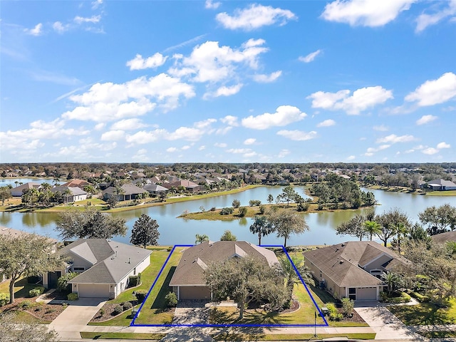 drone / aerial view featuring a water view