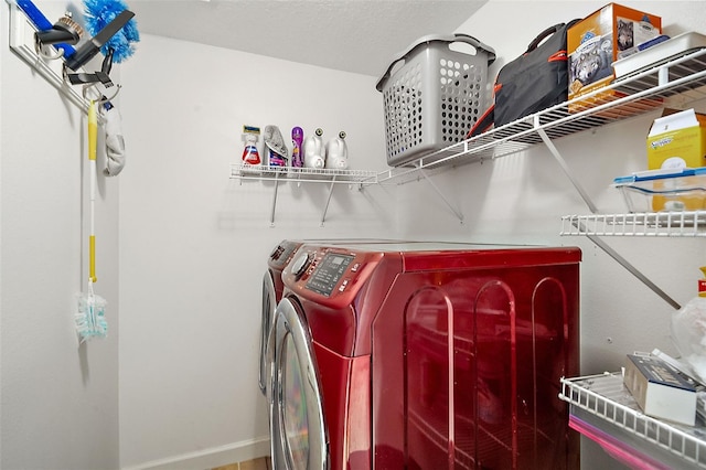 washroom featuring washing machine and dryer