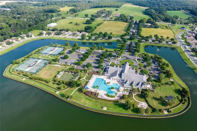 birds eye view of property with a water view