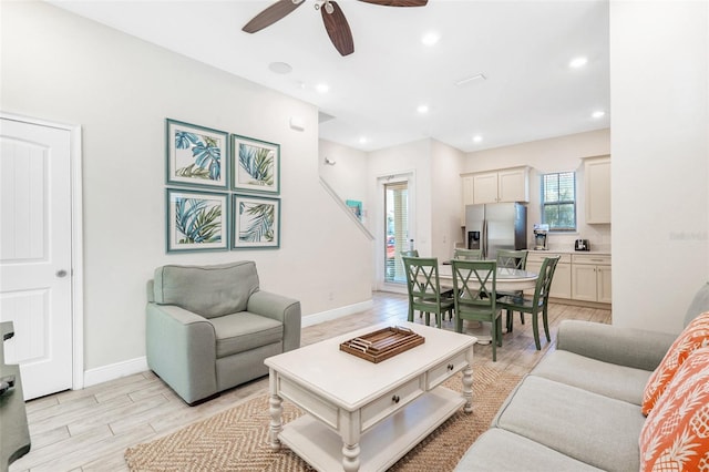 living room featuring ceiling fan