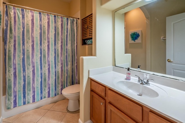 full bathroom featuring vanity, tile patterned floors, toilet, and shower / bathtub combination with curtain