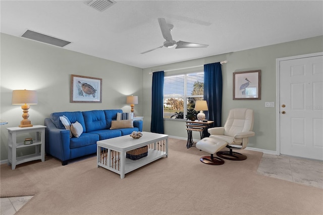 living room featuring light carpet and ceiling fan