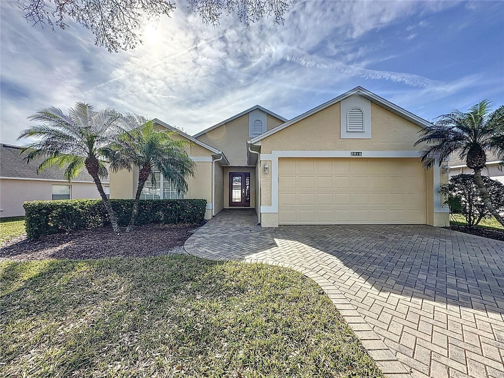 single story home with a garage