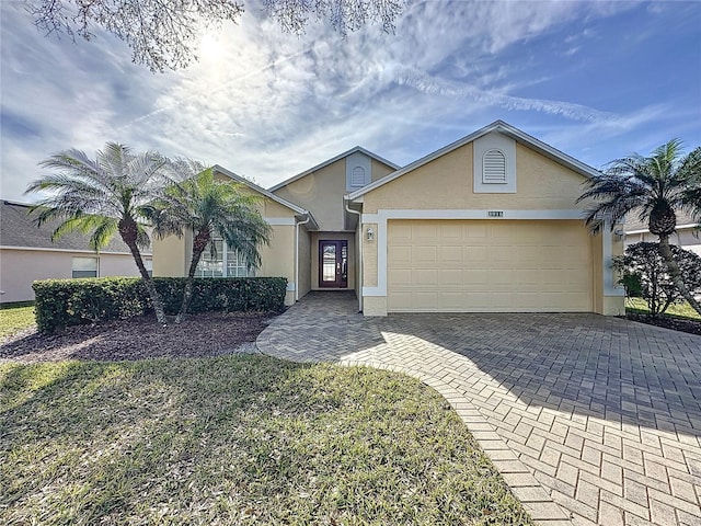 single story home with a garage