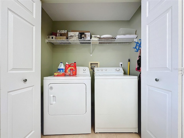 laundry room featuring separate washer and dryer