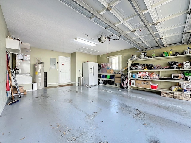 garage with a garage door opener, heating unit, electric panel, white refrigerator with ice dispenser, and water heater