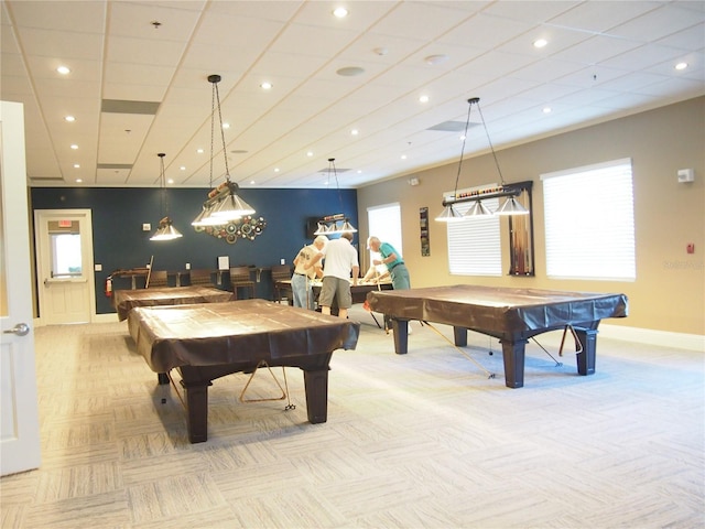 game room with pool table, a healthy amount of sunlight, and light carpet