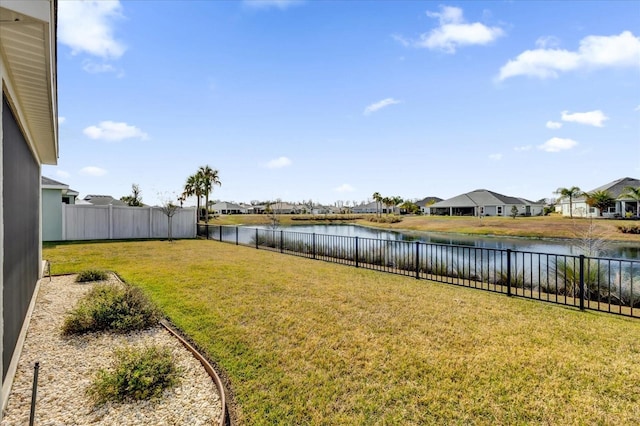 view of yard with a water view