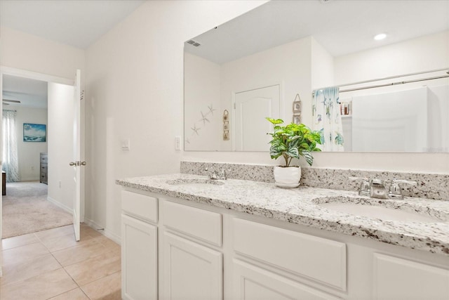 bathroom featuring vanity and tile patterned flooring