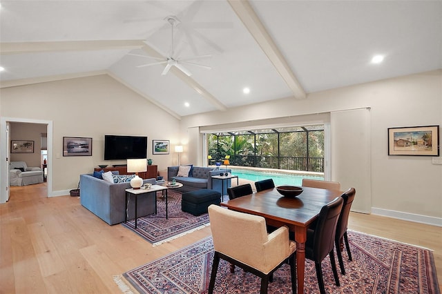 dining space with light hardwood / wood-style flooring, lofted ceiling with beams, and ceiling fan