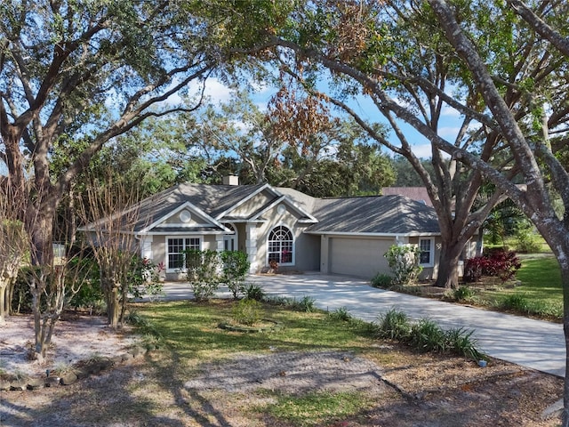 ranch-style home with a garage