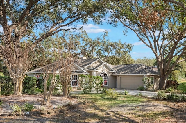 ranch-style home with a garage