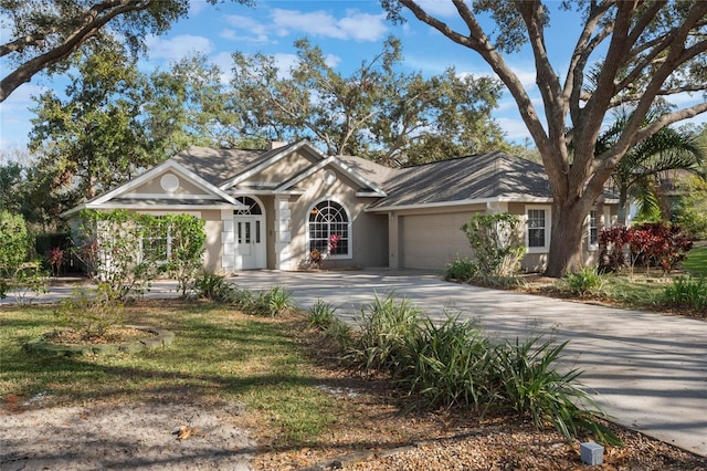 single story home with a garage