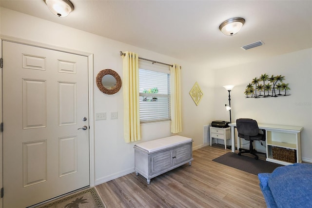 foyer with light hardwood / wood-style flooring