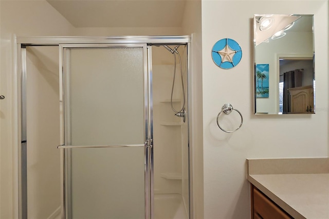 bathroom featuring vanity and walk in shower