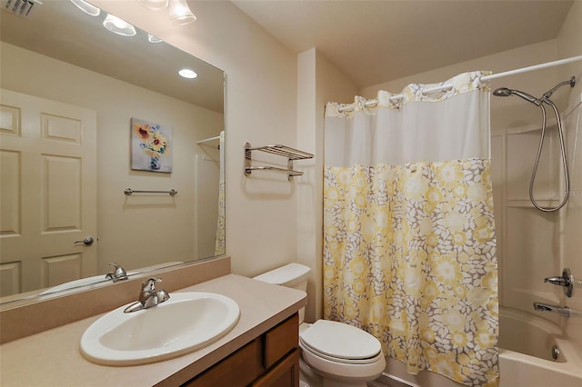 full bathroom featuring vanity, toilet, and shower / bath combo