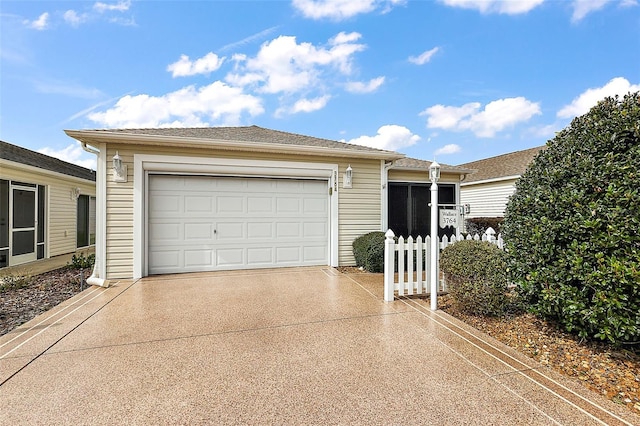 single story home featuring a garage