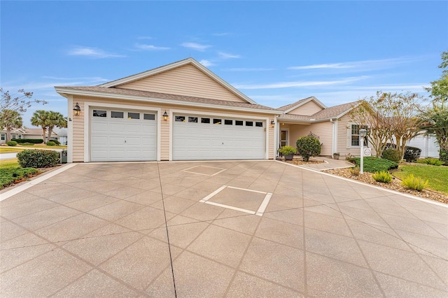 ranch-style home with a garage