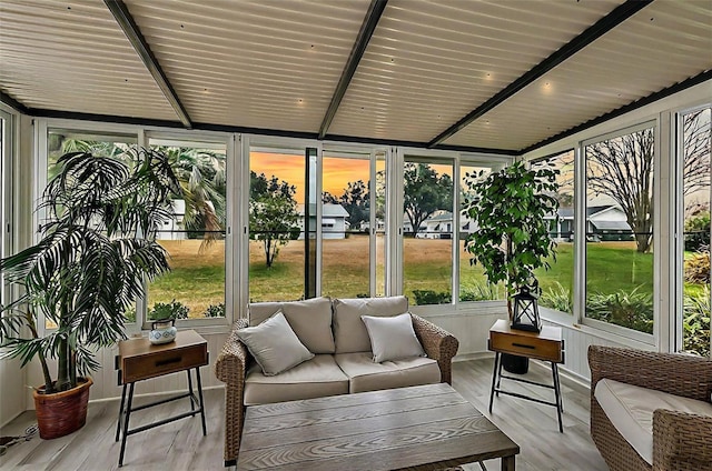 sunroom / solarium with beamed ceiling