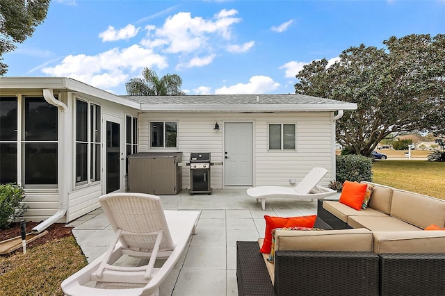 view of patio / terrace featuring an outdoor living space and a grill