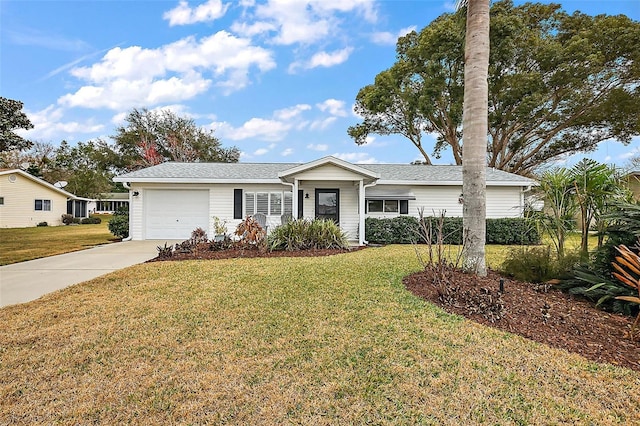 ranch-style house with a garage and a front yard