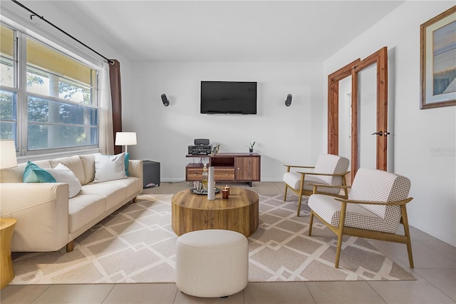 living room featuring tile patterned floors