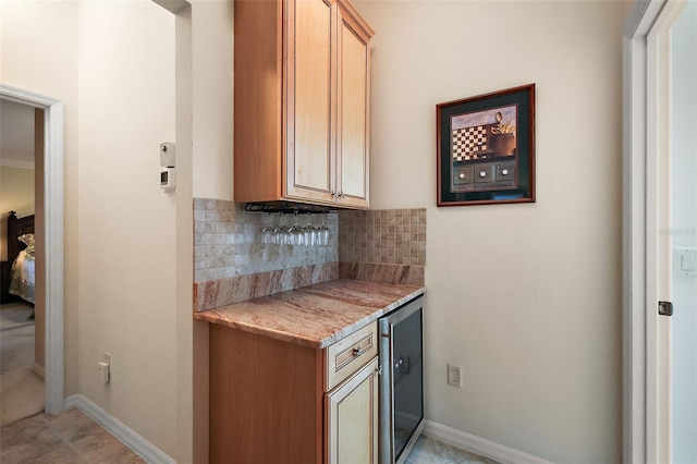 kitchen with backsplash and baseboards