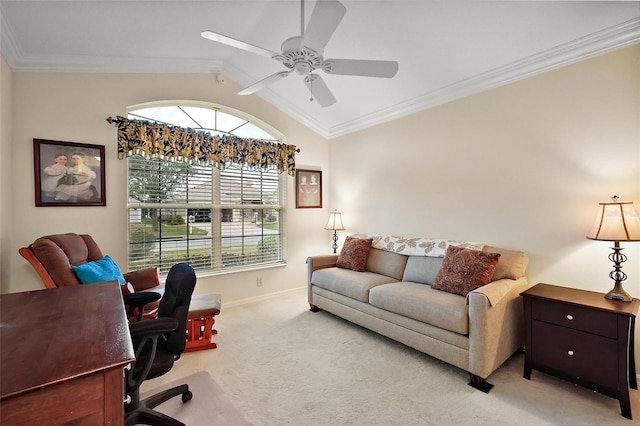 office space with ornamental molding, light colored carpet, vaulted ceiling, and ceiling fan