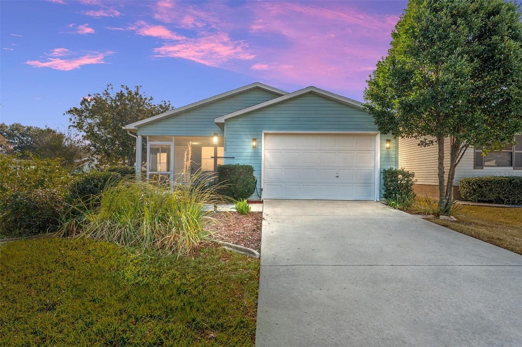 ranch-style house with a garage