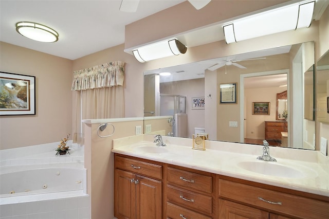 bathroom featuring vanity, separate shower and tub, and ceiling fan