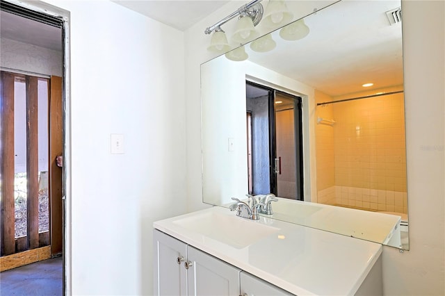 bathroom featuring visible vents and vanity