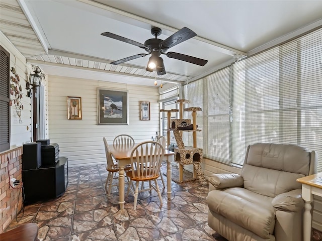 sunroom / solarium with ceiling fan