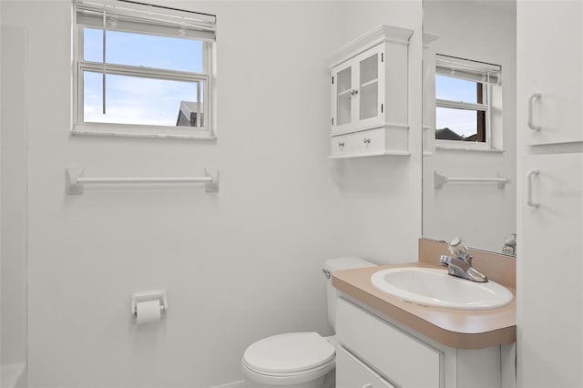 bathroom with vanity and toilet