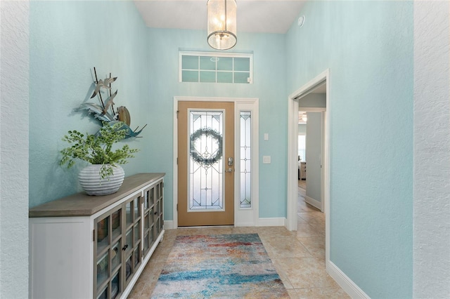 view of tiled foyer entrance