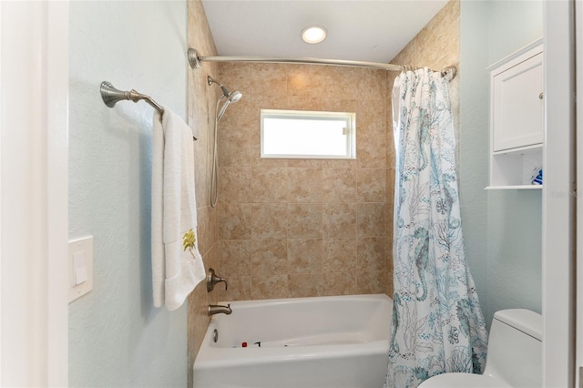 bathroom with shower / bathtub combination with curtain and toilet