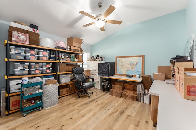 office featuring vaulted ceiling, ceiling fan, and light wood-type flooring